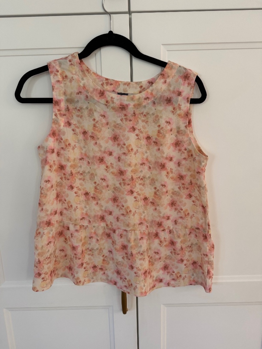 Sleeveless floral blouse